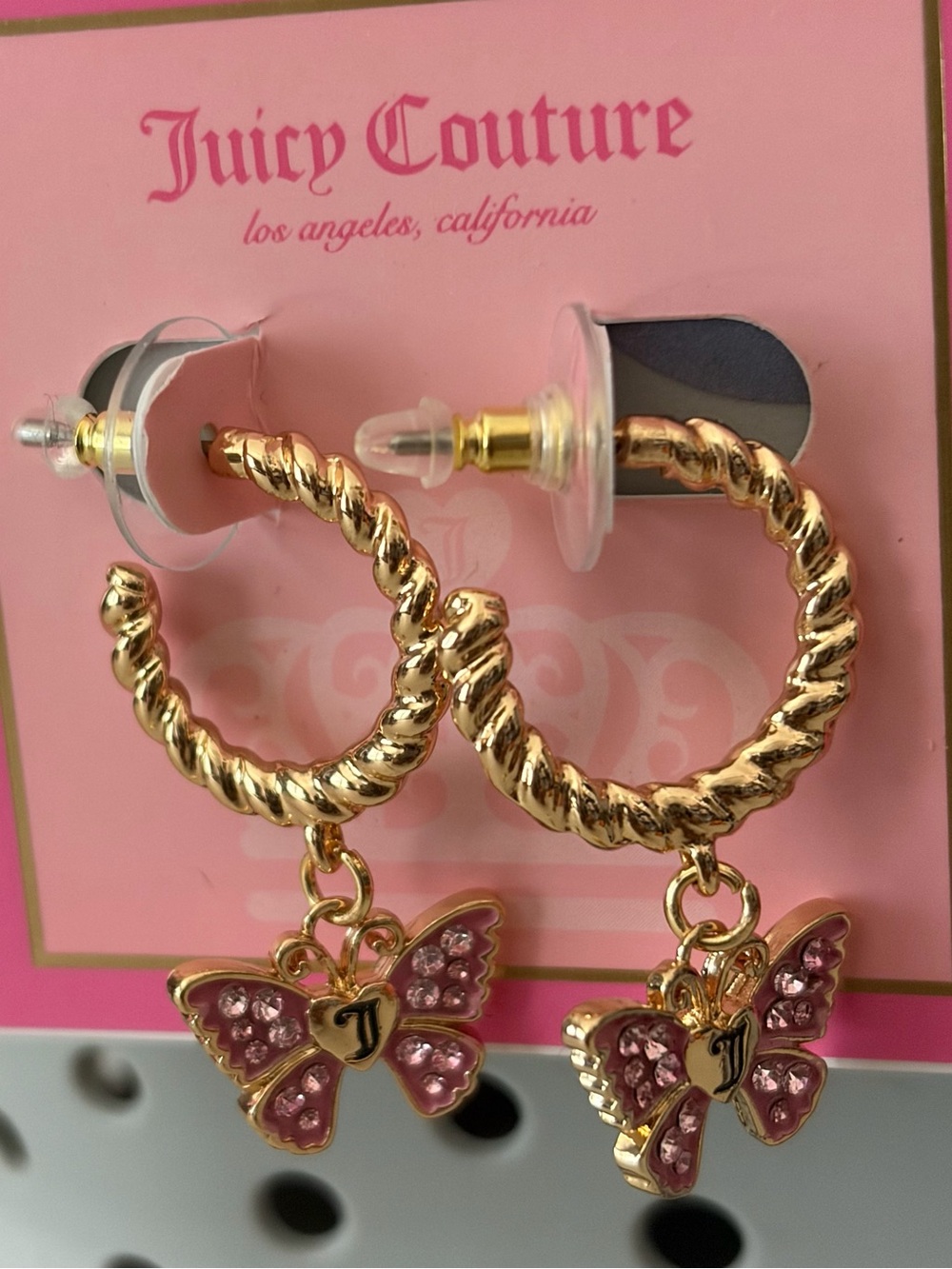 Juicy Couture Gold Twisted Hoop Earrings with Pink Crystal Butterfly Charms